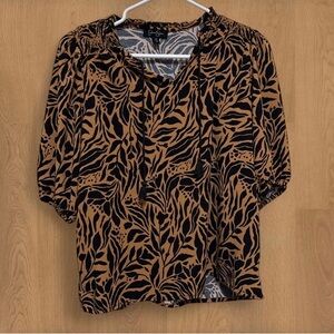 Jessica Simpson Beautiful black, coffee, and brown blouse for any occasion.
